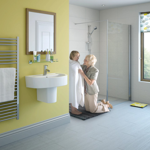 Bright and modern walk-in shower in a Portsmouth residence, featuring clear glass doors.